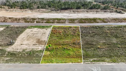 a view of swimming pool with a yard