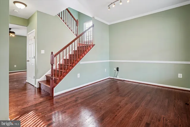 a view of entryway with wooden floor