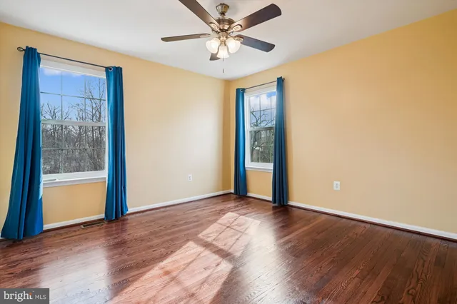 a view of a hallway with washer and dryer
