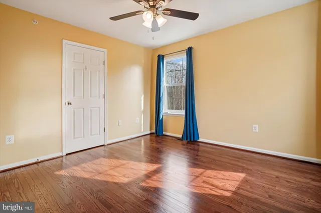 a view of kitchen with stainless steel appliances kitchen island granite countertop a stove and a sink