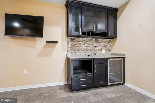 a view of balcony with wooden floor and fence