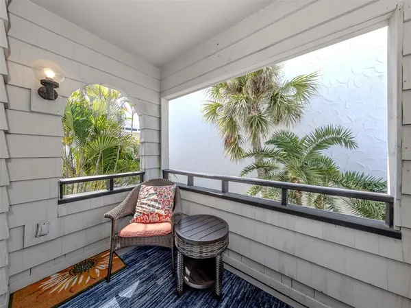 a bathroom with a toilet a sink and a shower