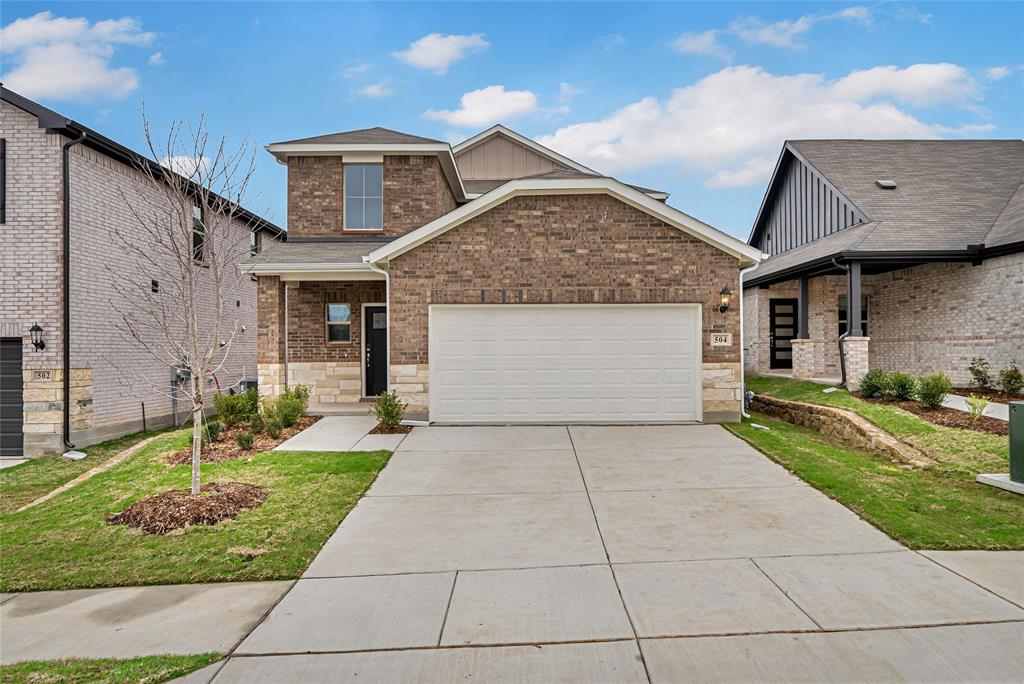504 Weller Road Lowry Crossing, TX 75069 - Photo 2 of 32 a front view of a house with garden