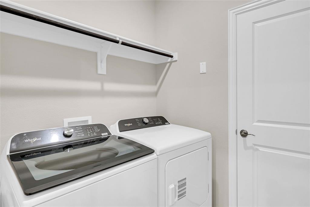 504 Weller Road Lowry Crossing, TX 75069 - Photo 21 of 32 a utility room with dryer and washer