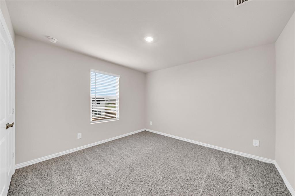 504 Weller Road Lowry Crossing, TX 75069 - Photo 27 of 32 a view of an empty room with a window