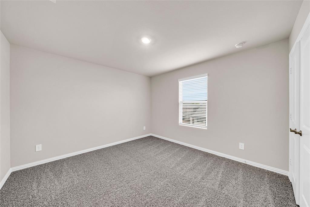 504 Weller Road Lowry Crossing, TX 75069 - Photo 28 of 32 a view of an empty room with a window