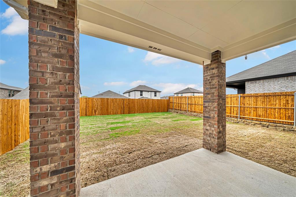 504 Weller Road Lowry Crossing, TX 75069 - Photo 29 of 32 a view of a back yard