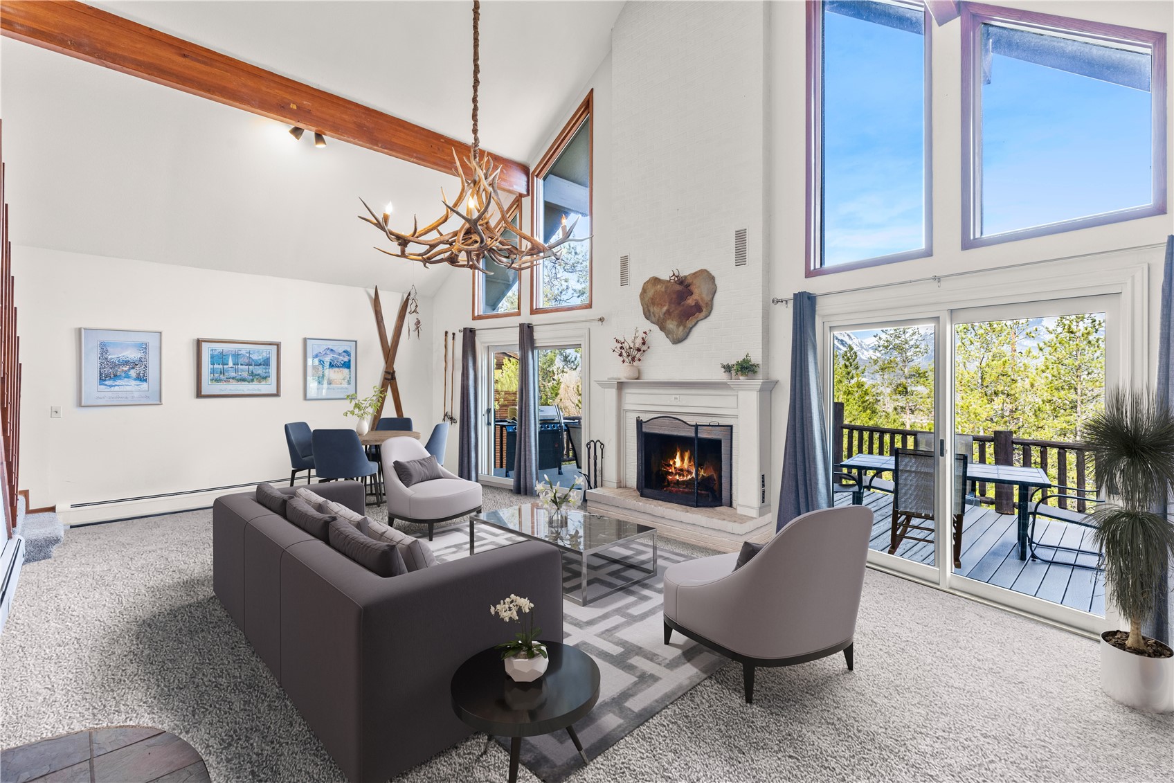 79 Forest Canyon Road Dillon, CO 80435 - Photo 6 of 50 Virtually Staged: Living room with beamed ceiling, plenty of natural light, a baseboard radiator, and a high ceiling