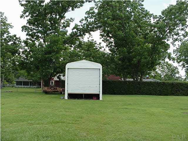 2442 Tate Road Cantonment, FL 32533 - Photo 13 of 15 RV shed with electricity.