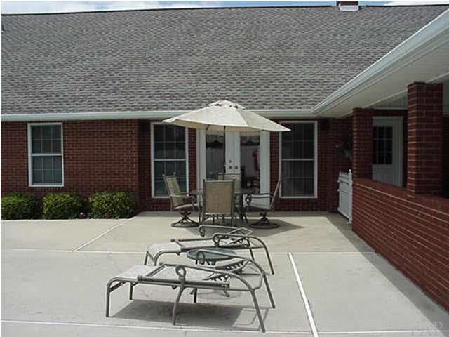 2442 Tate Road Cantonment, FL 32533 - Photo 3 of 15 Open patio area next to inground pool.