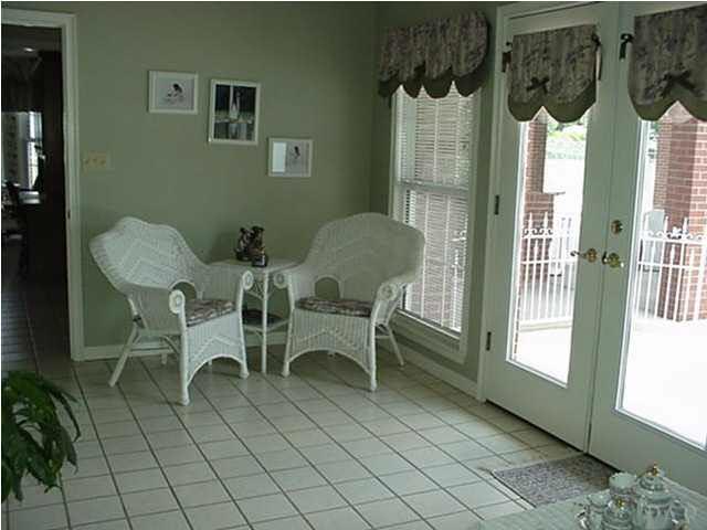 2442 Tate Road Cantonment, FL 32533 - Photo 5 of 15 Sun room with double doors to outside patio and inground pool. Also has doors to master bedroom.