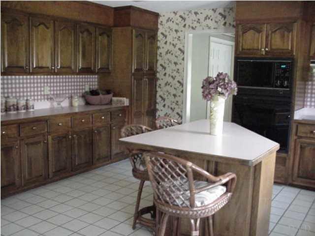 2442 Tate Road Cantonment, FL 32533 - Photo 7 of 15 Island in spacious kitchen with numerous cabinets.