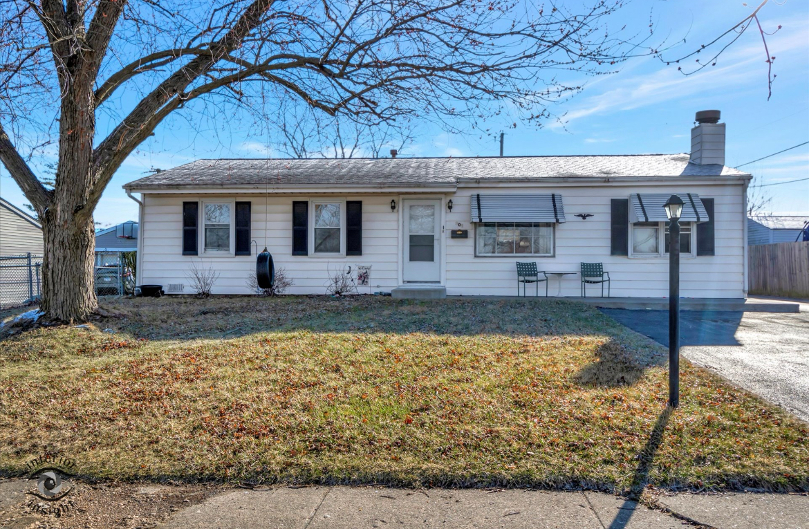 202 MacGregor Road Lockport, IL 60441 - Photo 2 of 26 a front view of a house with swimming pool