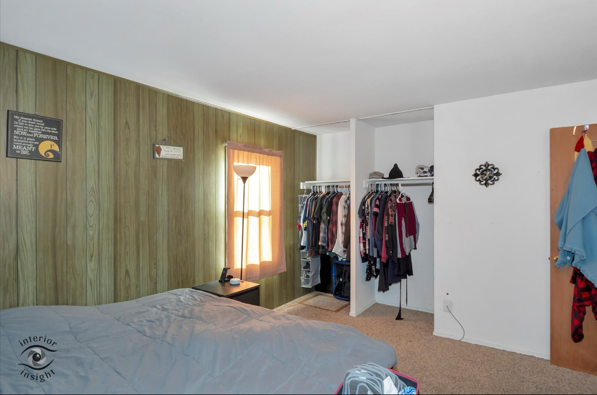 202 MacGregor Road Lockport, IL 60441 - Photo 22 of 26 a bedroom with a bed and a closet