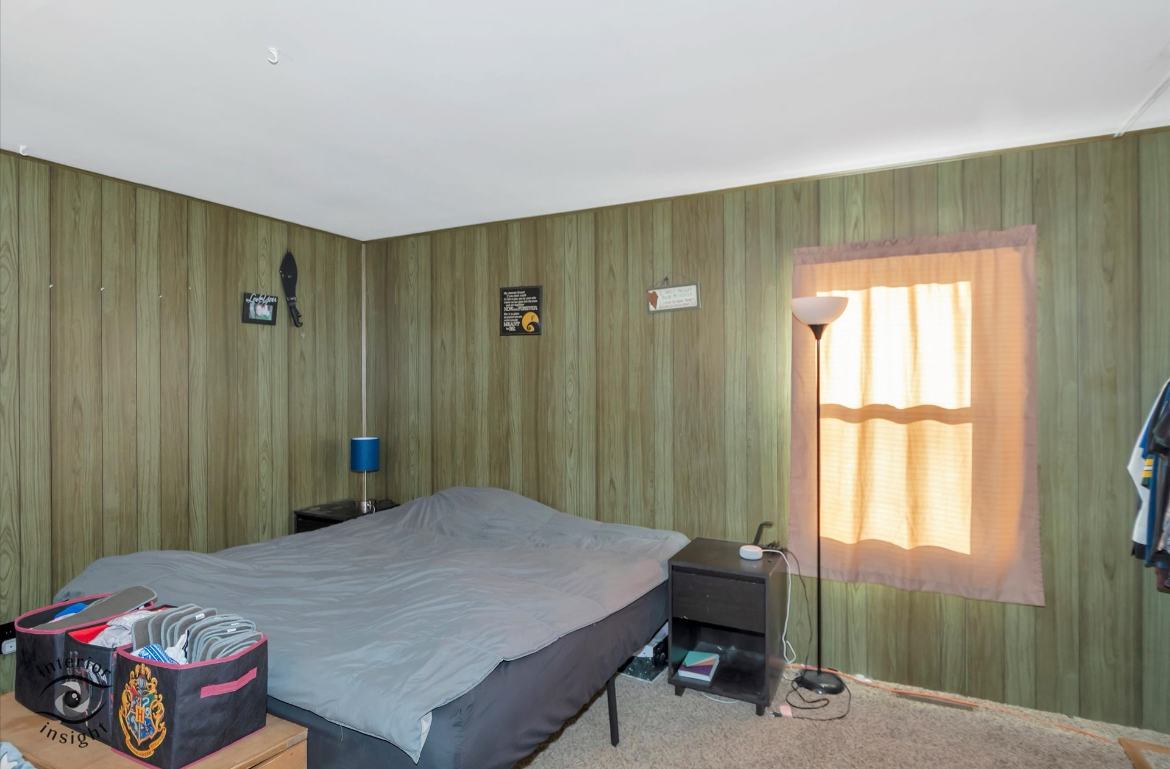 202 MacGregor Road Lockport, IL 60441 - Photo 3 of 26 a bedroom with a bed and a window