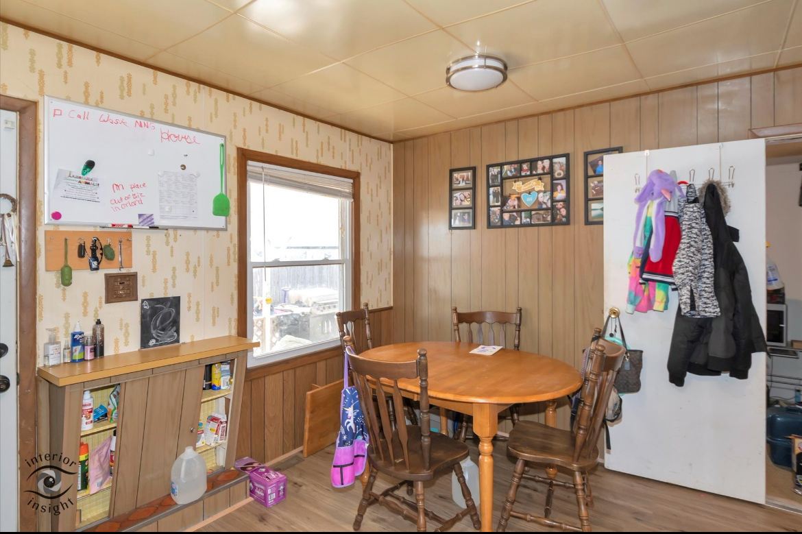 202 MacGregor Road Lockport, IL 60441 - Photo 6 of 26 a view of a dining room with furniture and a window