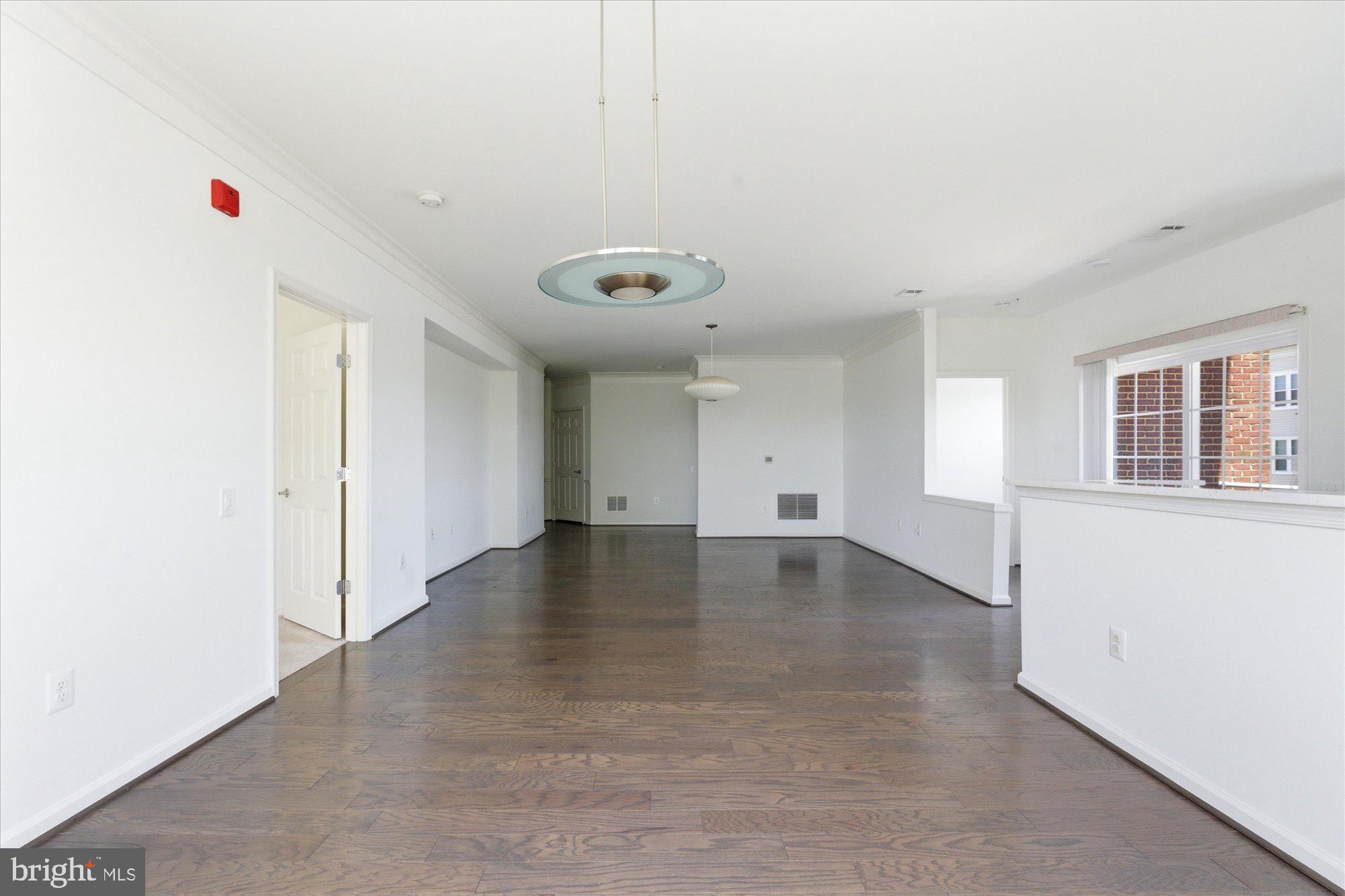 20650 Hope Spring Terrace, Unit 301 Ashburn, VA 20147 - Photo 14 of 35 Dining overlooking living and kitchen