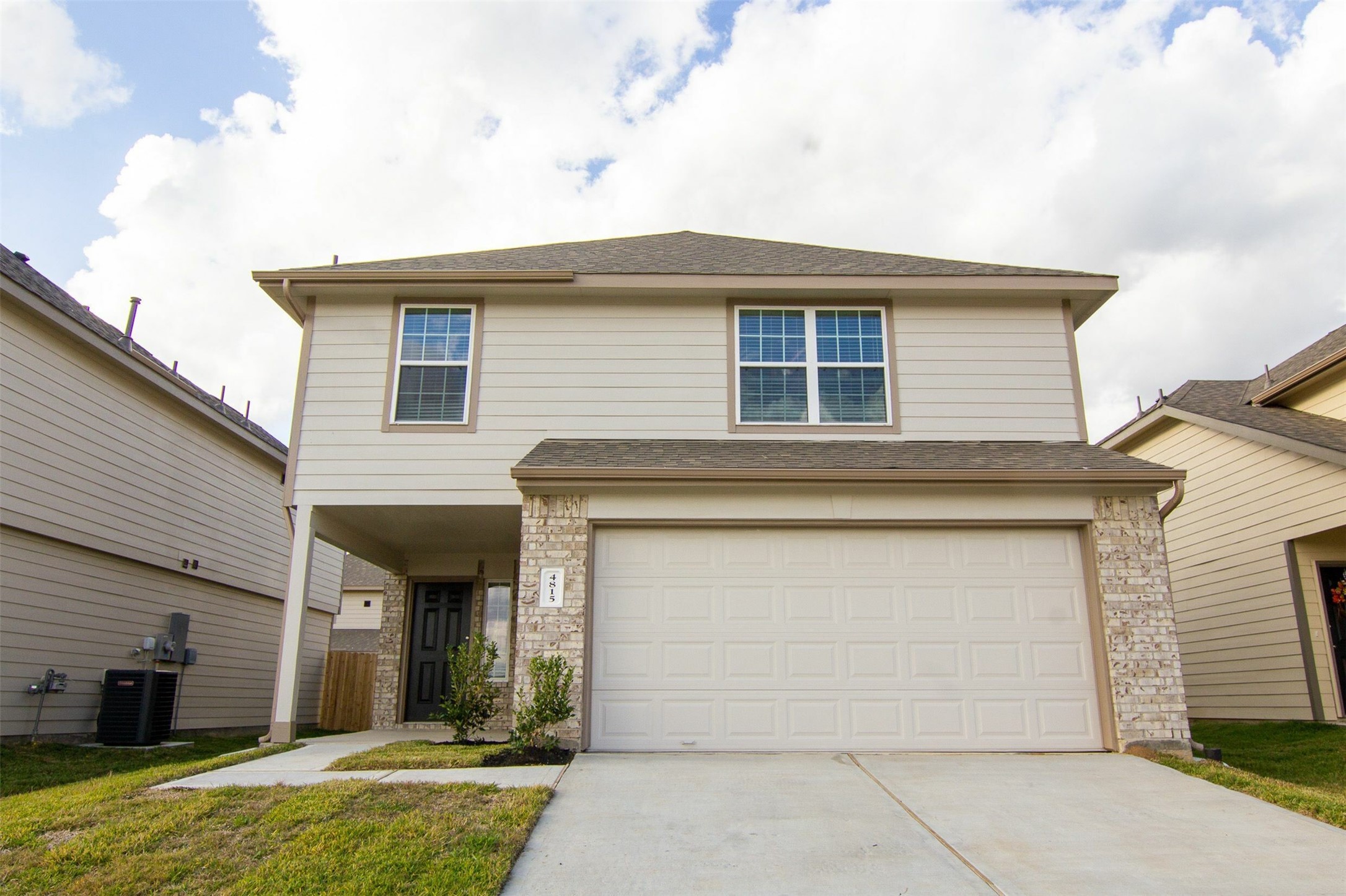 a front view of house with garage