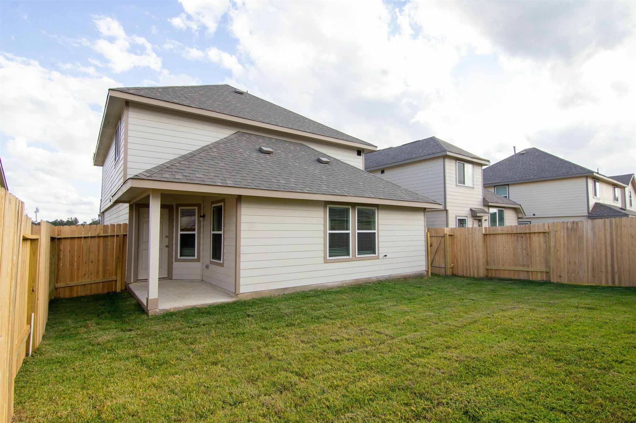 4815 Sweet Chestnut Lane Spring, TX 77373 - Photo 2 of 19 a view of a house with a yard and a garden