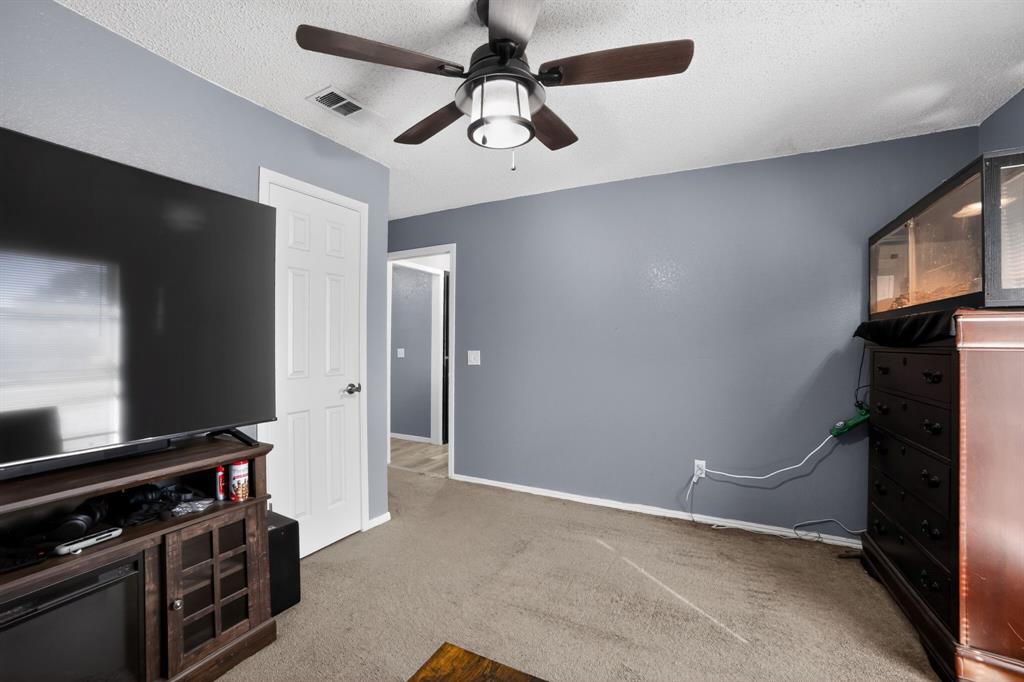 116 Curtis Lane Quinlan, TX 75474 - Photo 13 of 31 wooden floor in an empty room