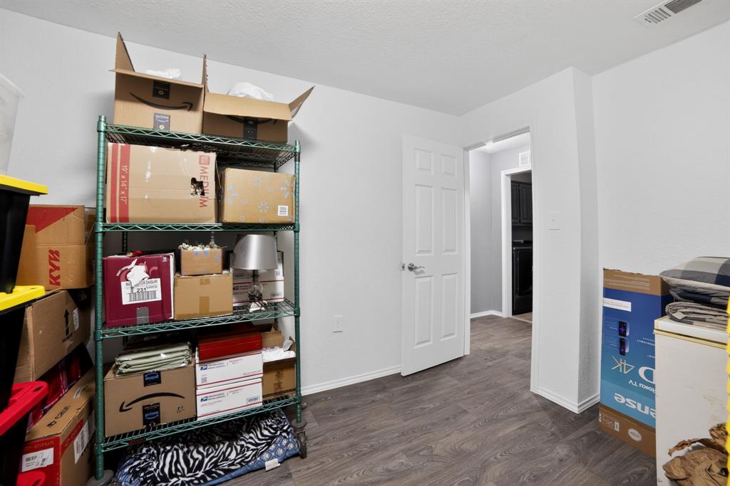 116 Curtis Lane Quinlan, TX 75474 - Photo 20 of 31 a area with furniture and closet