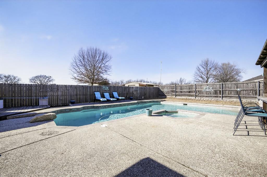 116 Curtis Lane Quinlan, TX 75474 - Photo 23 of 31 a view of swimming pool with outdoor seating and wooden floor