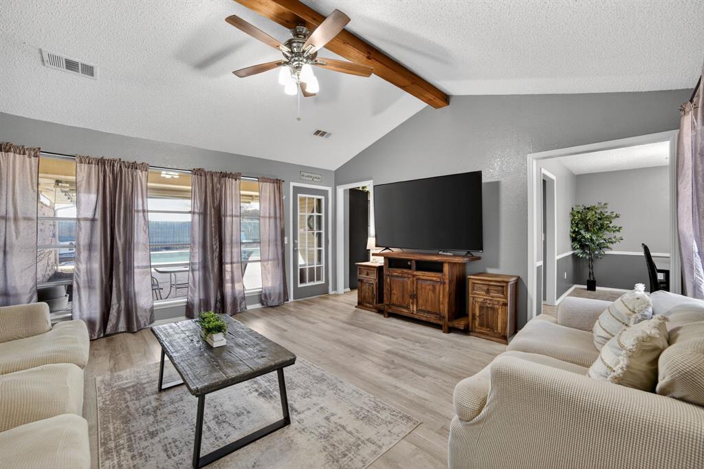 116 Curtis Lane Quinlan, TX 75474 - Photo 4 of 31 a living room with furniture and a flat screen tv