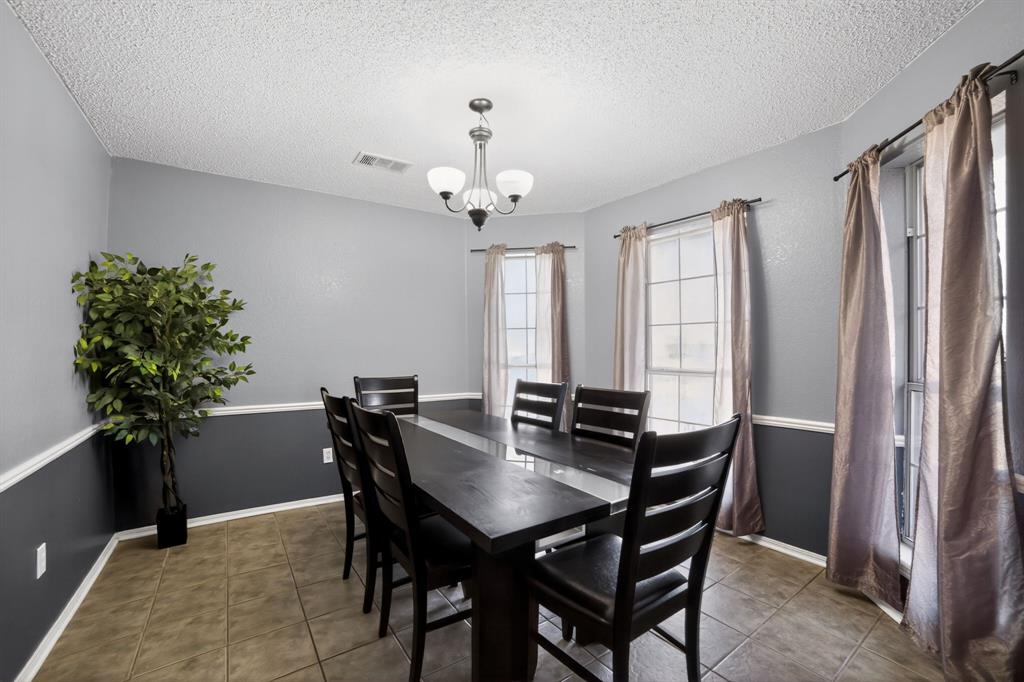 116 Curtis Lane Quinlan, TX 75474 - Photo 7 of 31 a view of a dining room with furniture and window