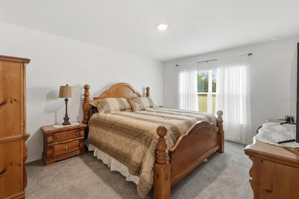 a bathroom with a shower sink double and mirror