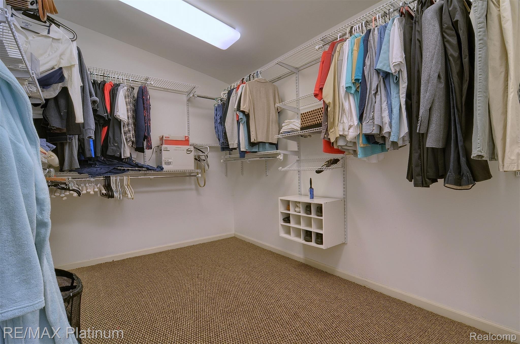 578 Ridge Road Walled Lake, MI 48390 - Photo 21 of 34 21-Master Bedroom Walk-In Closet.jpg
