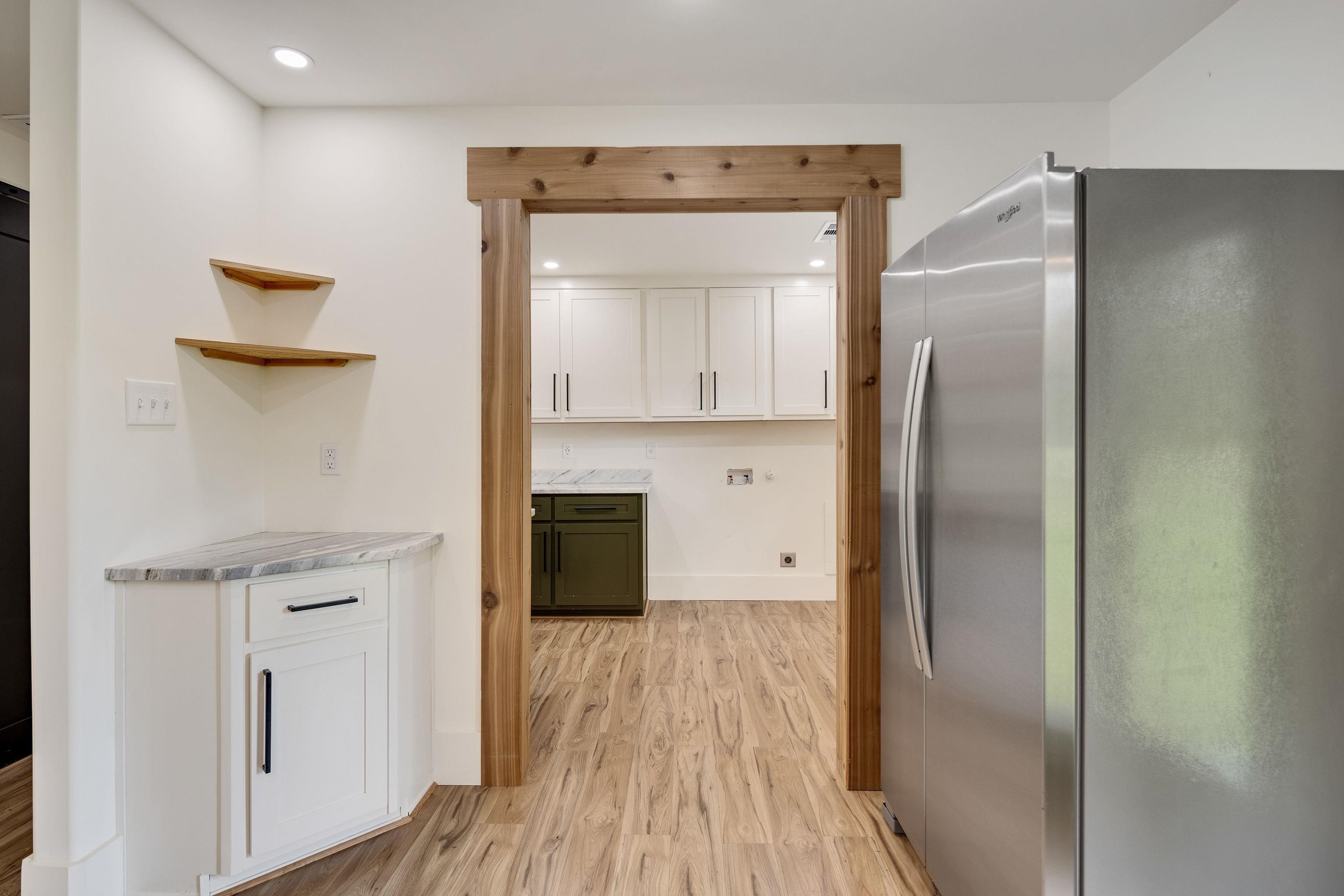 240 Dogwood Road Somerville, TN 38068 - Photo 13 of 37 a kitchen with a refrigerator and a sink