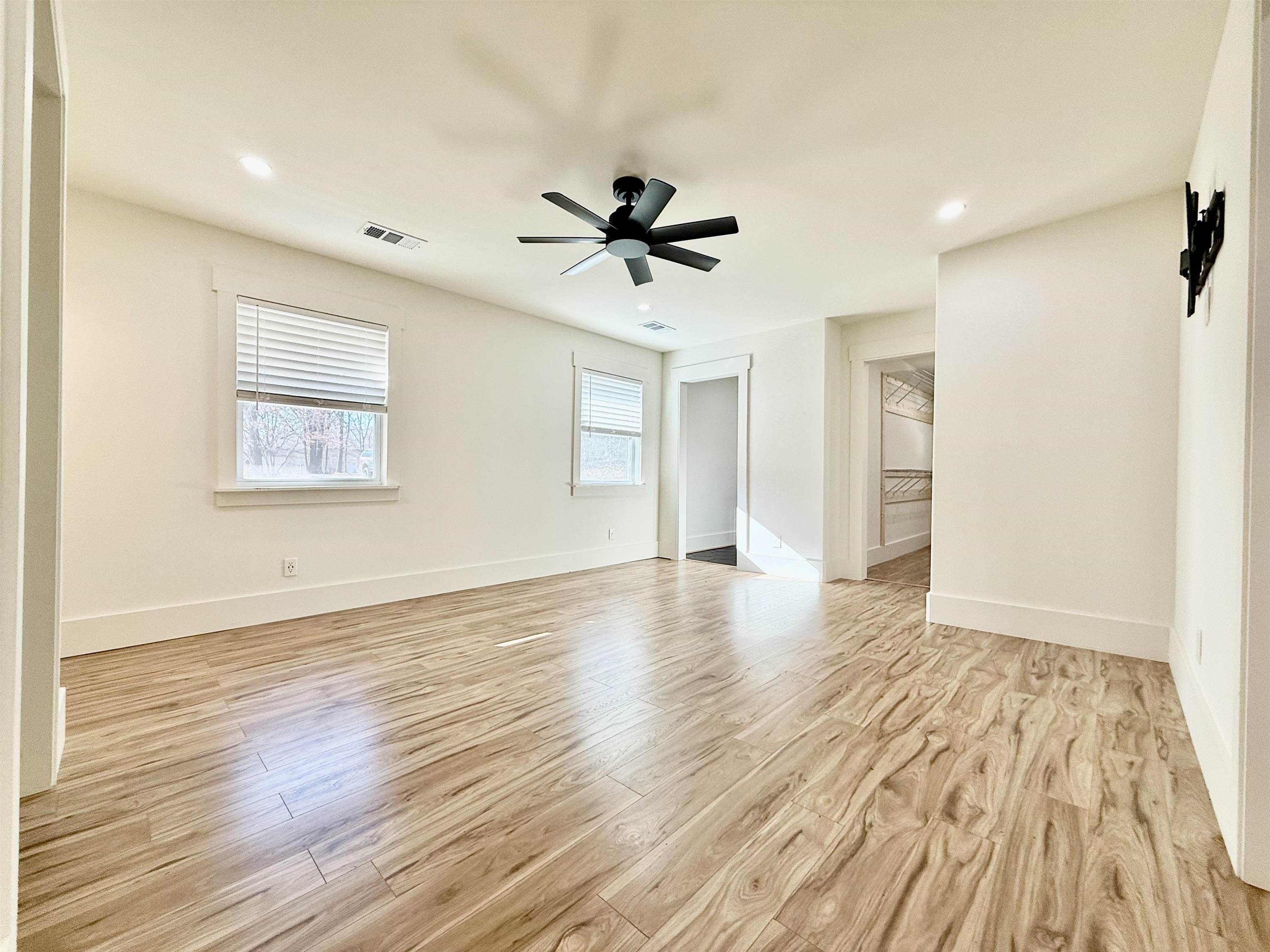 240 Dogwood Road Somerville, TN 38068 - Photo 16 of 37 a view of a big room with wooden floor and windows