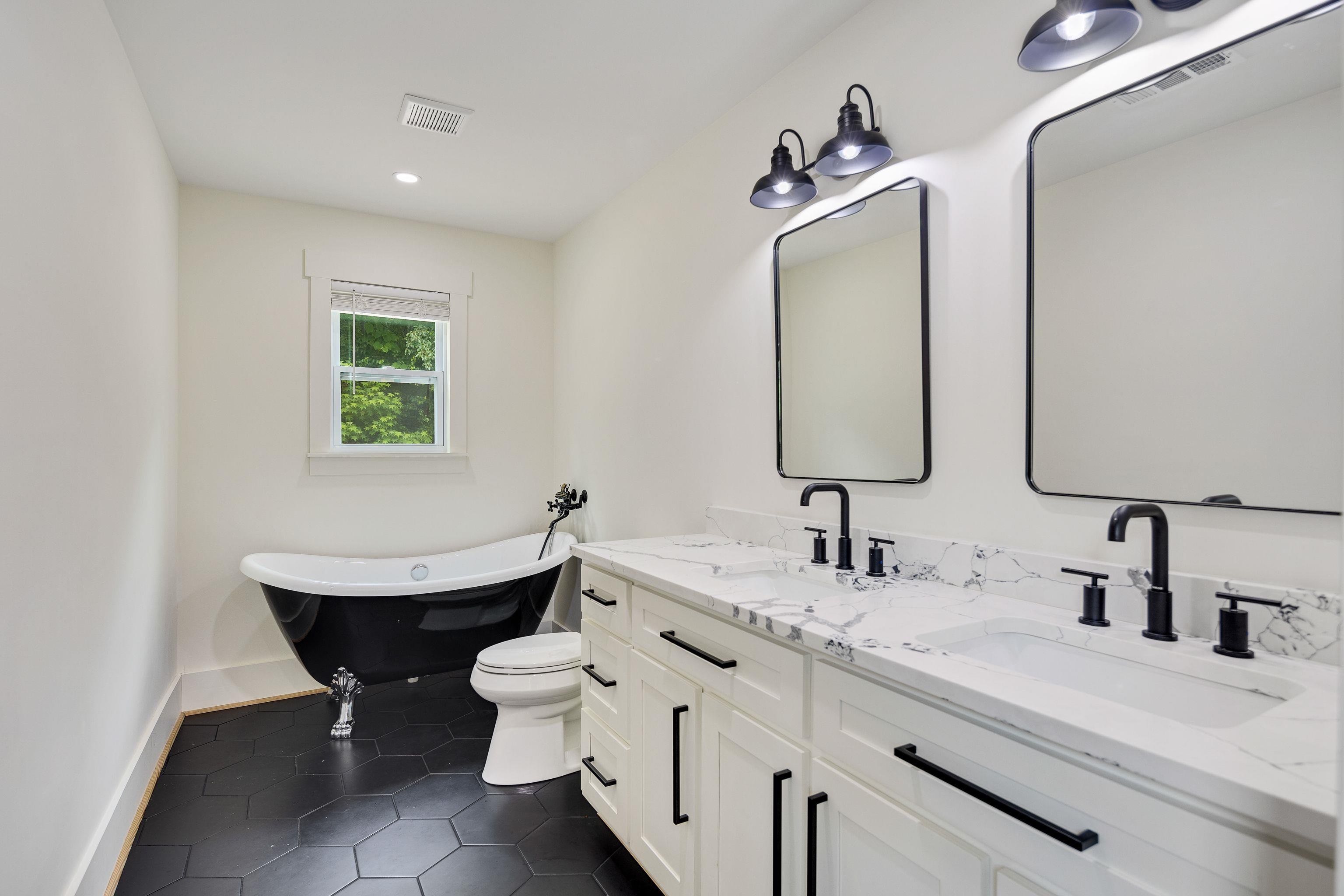 240 Dogwood Road Somerville, TN 38068 - Photo 20 of 37 a bathroom with a double vanity sink mirror and toilet