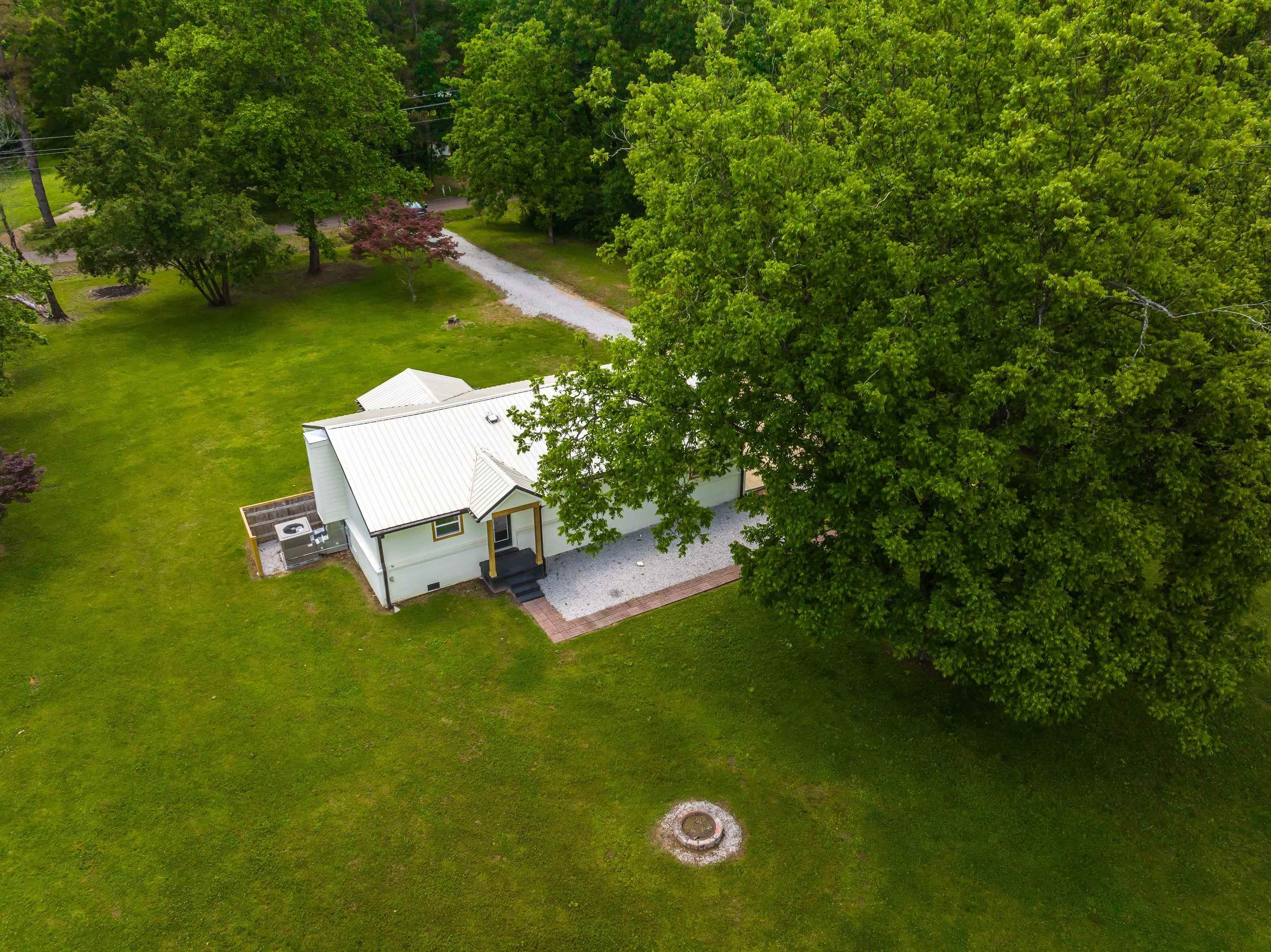 240 Dogwood Road Somerville, TN 38068 - Photo 2 of 37 a view of a wooden floor and a yard