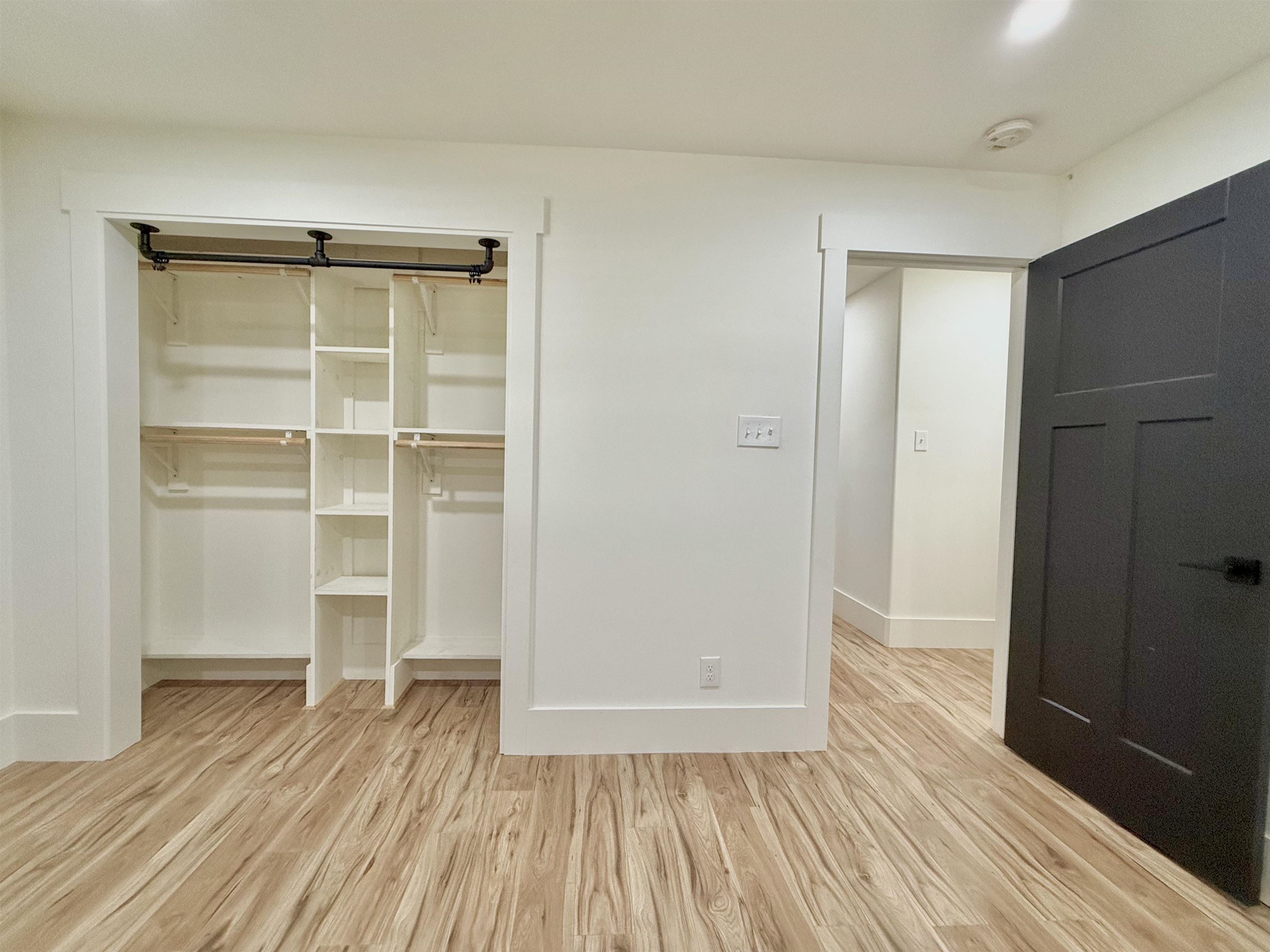 240 Dogwood Road Somerville, TN 38068 - Photo 22 of 37 a view of an empty room with wooden floor and closet