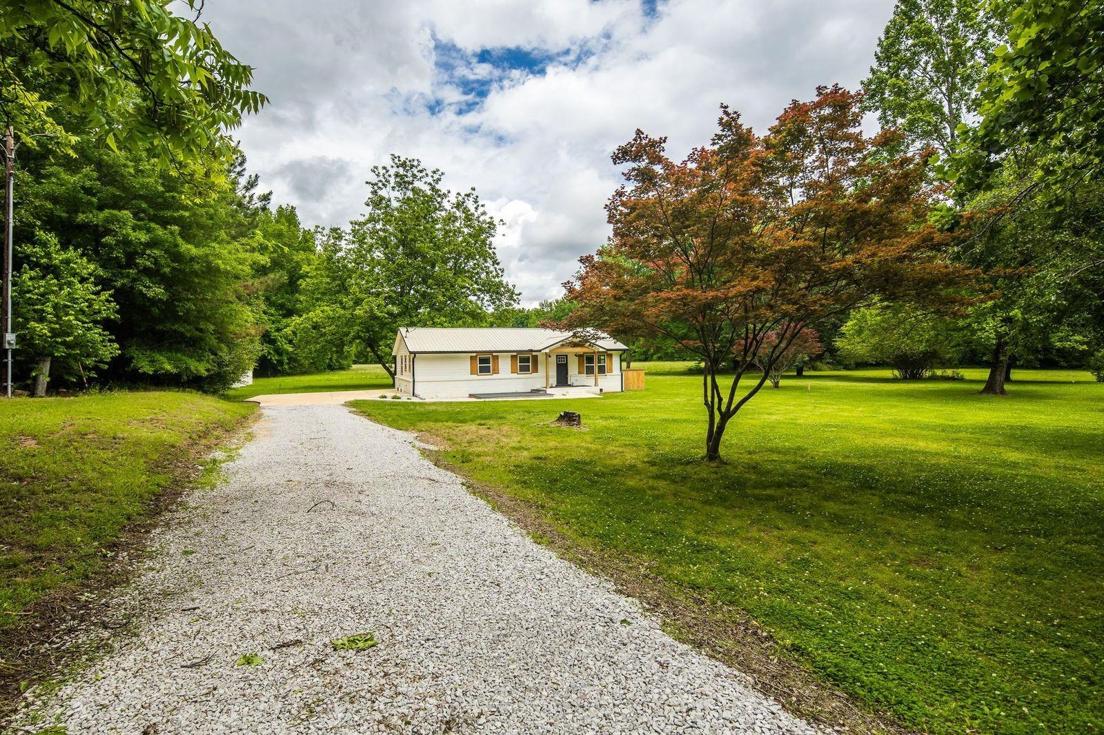 240 Dogwood Road Somerville, TN 38068 - Photo 37 of 37 a view of a house with a yard