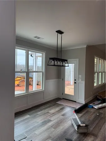 a view of an empty room and window