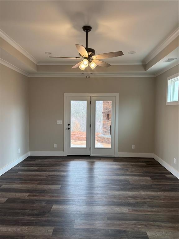 647 Fairview Road Pendergrass, GA 30567 - Photo 18 of 34 a view of empty room with wooden floor and fan