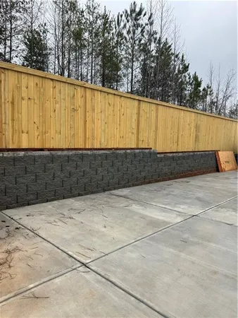 a view of a backyard of the house