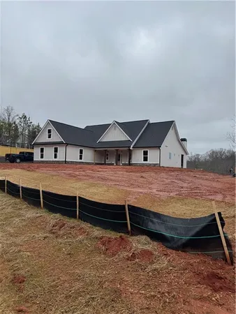 a backyard of house with wooden floor
