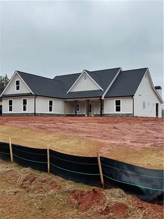 a house view with a garden space