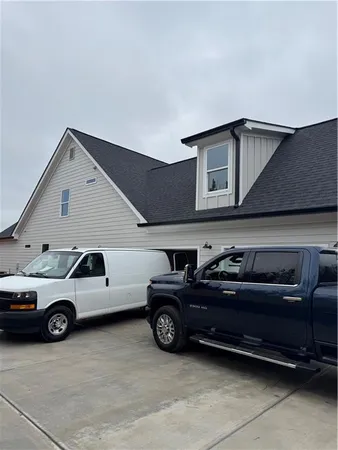 a car parked in front of a house