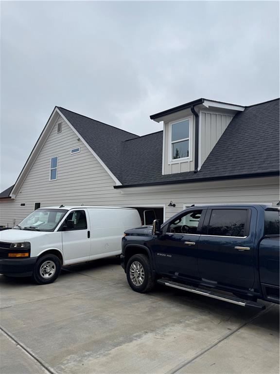 647 Fairview Road Pendergrass, GA 30567 - Photo 6 of 34 a car parked in front of a house