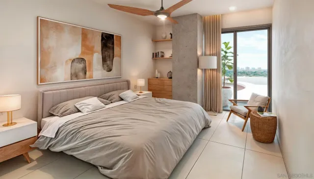 a bedroom with a bed and a window