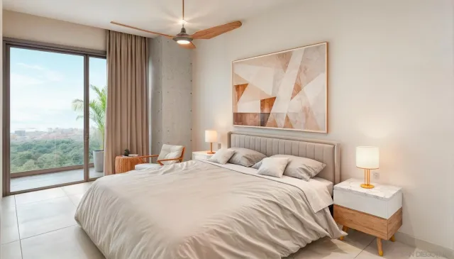 a bed sitting in a bedroom next to a large window