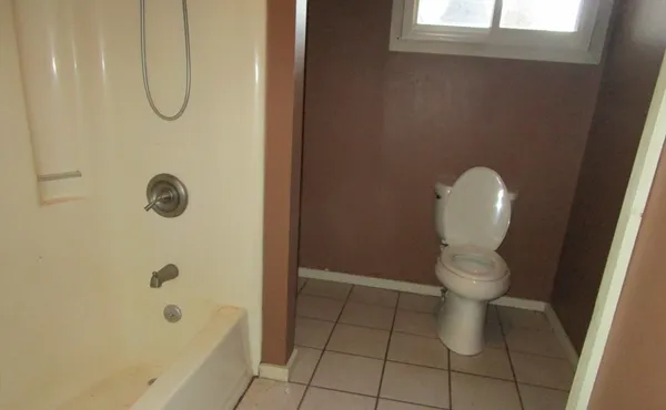 a bathroom with a toilet