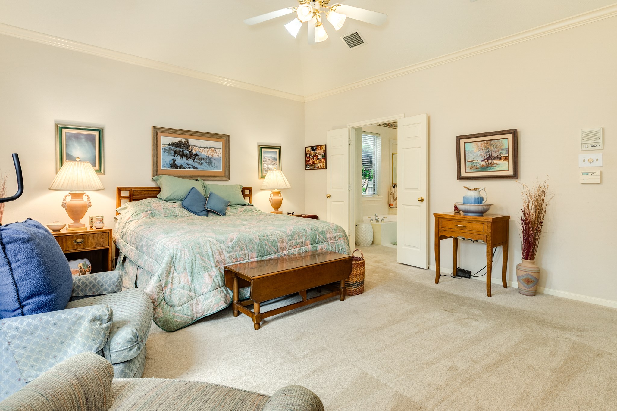 16522 Shadow Path Drive Pasadena, TX 77059 - Photo 18 of 33 a bedroom with a bed and a chandelier