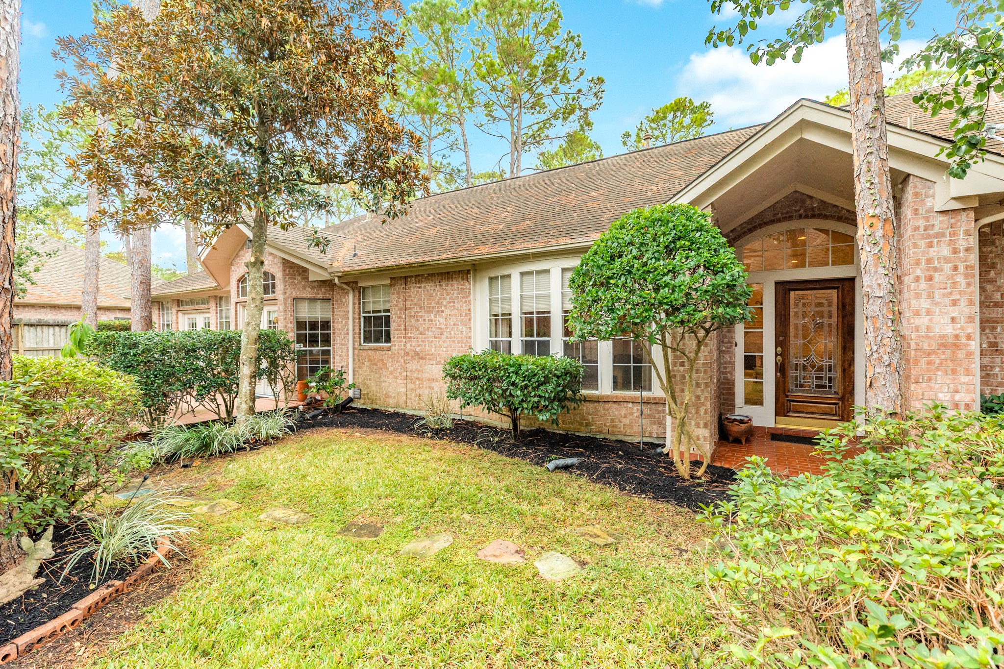 16522 Shadow Path Drive Pasadena, TX 77059 - Photo 2 of 33 a view of a house with backyard and sitting area