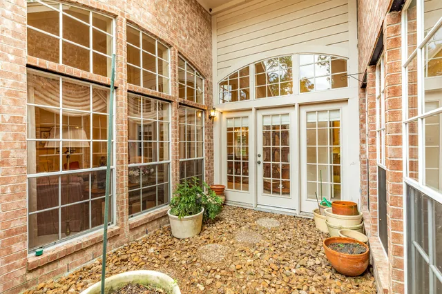 a front view of a house with outdoor space
