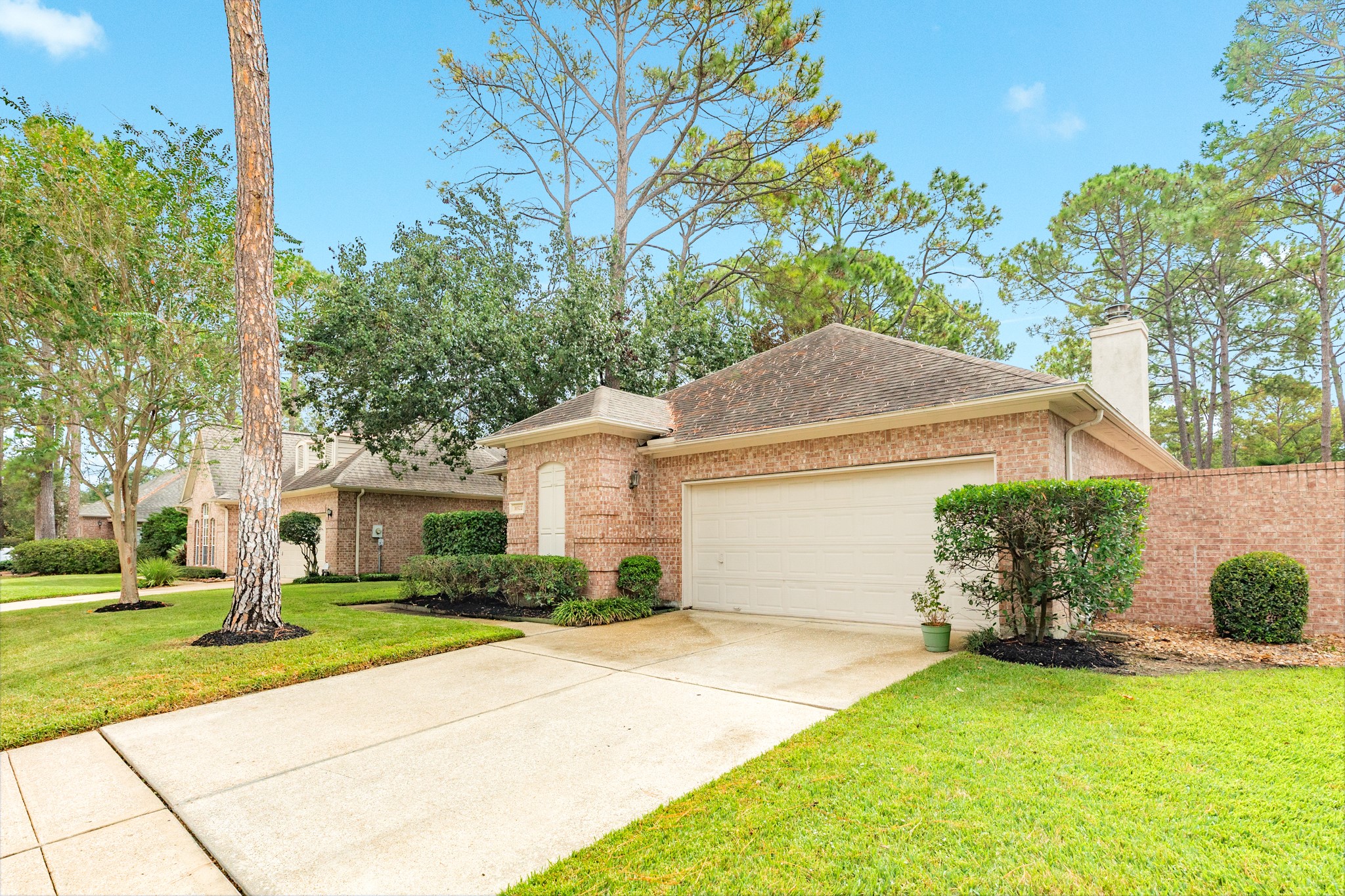16522 Shadow Path Drive Pasadena, TX 77059 - Photo 29 of 33 a front view of a house with a yard and garage
